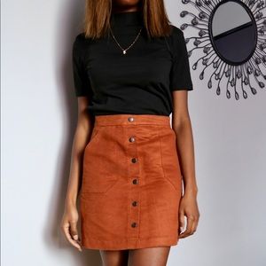 Mini brown faux suede skirt with pockets